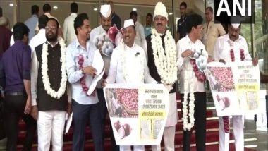 India News | NCP MLAs Turn Up with Onion Garlands at Maharashtra Assembly, Seek Remedial Measures as Prices Dip