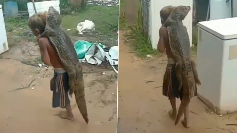 Viral Video: Boy Carries Baby Crocodile on His Back, Leaves Netizens Stunned