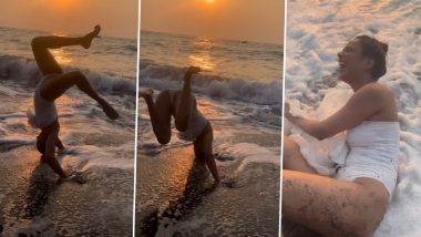 Nia Sharma Laughs at Herself After She Fails to Do a Cartwheel in White Monokini at Beach (Watch Video)