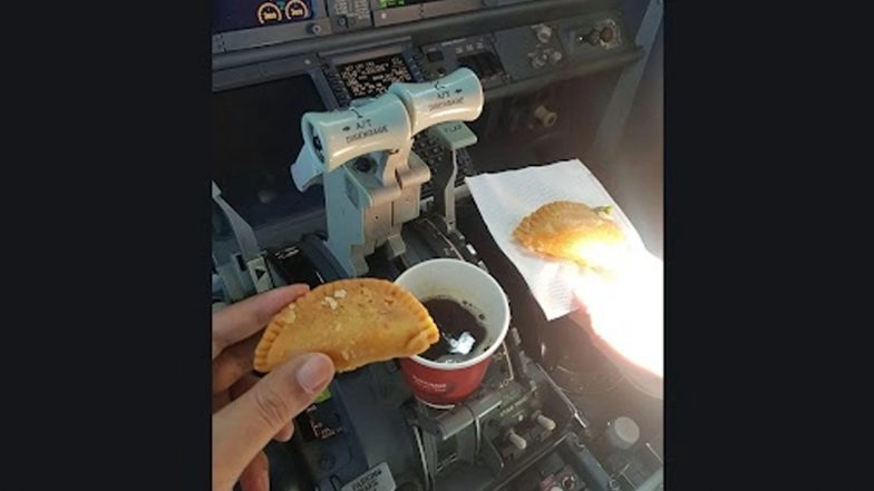Photo of SpiceJet Pilots Having 'Gujhiyas' and Beverage in Cockpit Goes Viral, Grounded After DGCA Intervention