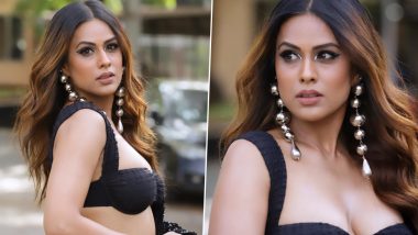 Nia Sharma Flaunts Her Sexy Waistline in a Shimmery Black Saree with a Low-Cut Blouse (View Pics)