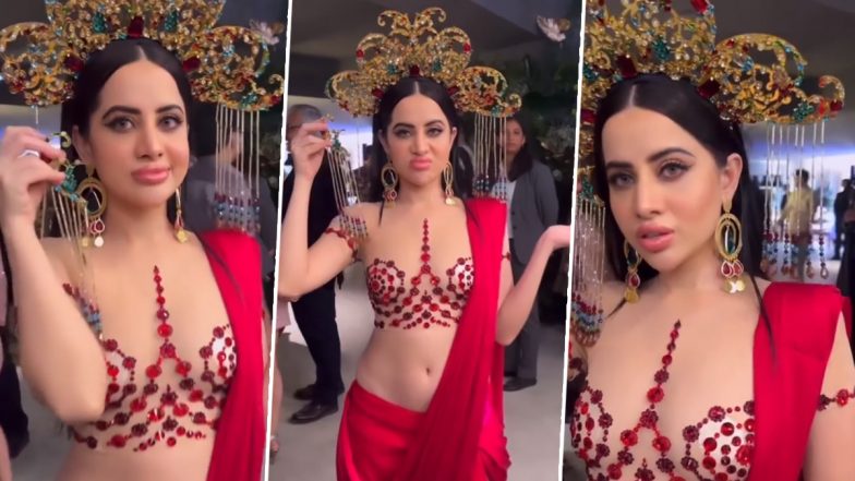 Uorfi Javed Wear Low- Waist Red Colour Saree With Crown at Abu Jani-Sandeep Khosla’s Fashion Event (Watch Video)