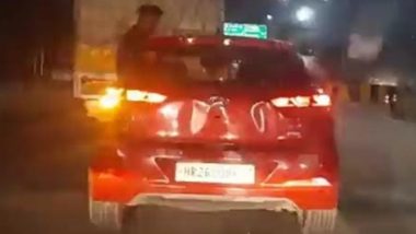 Noida: Youth Sits on Window of Speeding Car, Police Launch Probe After Video Goes Viral