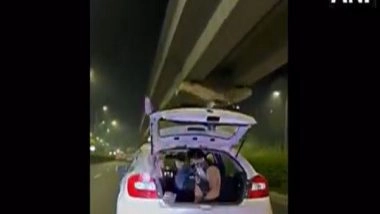 India News | Two Arrested for Throwing Currency Notes from Running Car in Haryana's Gurugram