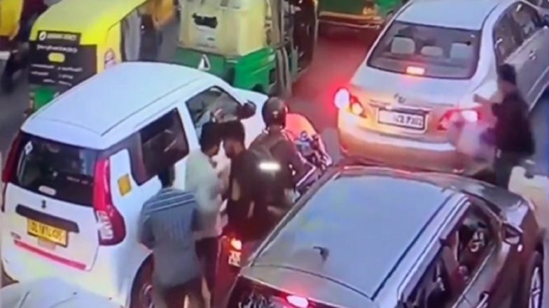 Video: Two Men Steal Rs 40 Lakh From Biker’s Backpack Near Red Fort in Delhi, Act Caught on Camera