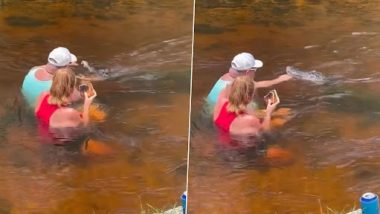 Florida Couple Chills in the River While Casually Feeding Alligators! Bone-Chilling Video Goes Viral
