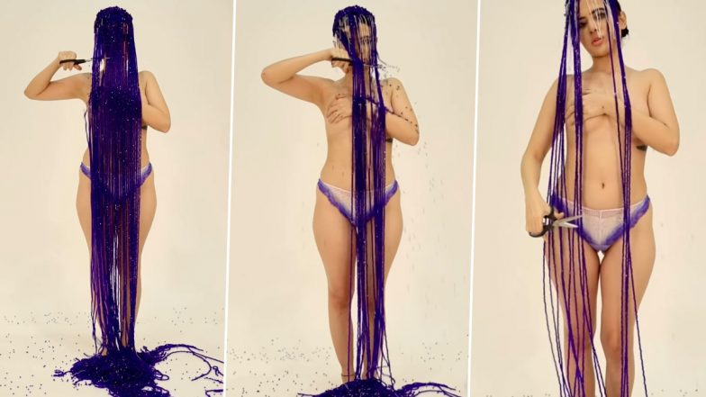 Uorfi Javed Goes Semi-nude, Covers Her B**bs with One Hand and Cuts Long Purple Pearl Hair Strings in New Video- WATCH