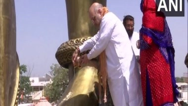 India News | Amit Shah Unveils 54-feet-tall Statue of Lord Hanuman at Temple in Gujarat