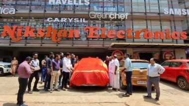 Business News | Nikshan Electronics and LG Home Appliances Hand over Car to Lucky Draw Winner