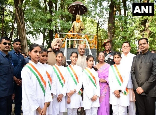 India News | Uttarakhand CM Dhami Garlands Statue of BR Ambedkar on Birth Anniversary