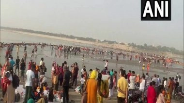 India News | Akshaya Tritiya: Devotees Take Holy Dip at Sangam in UP's Prayagraj