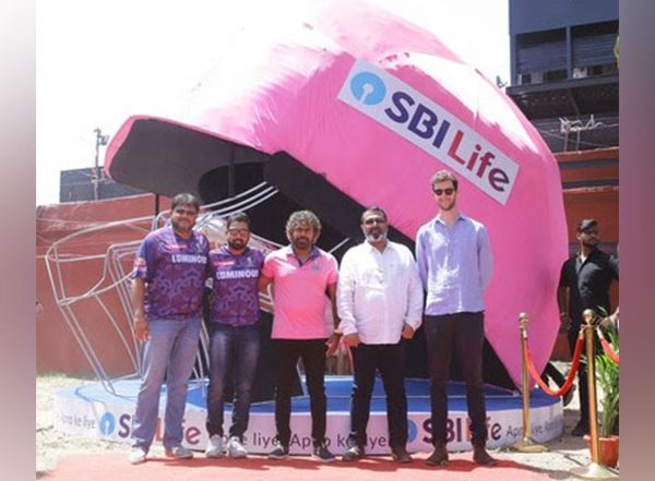 Business News | SBI Life Insurance and Rajasthan Royals Franchise Unveils a Larger-than-life 'helmet' Installation at Sawai Mansingh Stadium, Jaipur