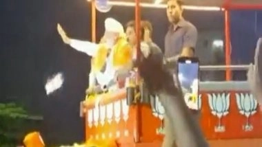 India News | Security Breach During PM Modi's Karnataka Roadshow, Mobile Phone Thrown at His Vehicle