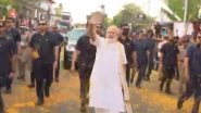 PM Narendra Modi in Kerala: People Shower Flower Petals on Prime Minister During His Roadshow in Kochi (Watch Videos)