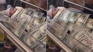 Man Covers Newborn Baby With High-Value Currency Notes, Video of Extravagant Celebration Goes Viral