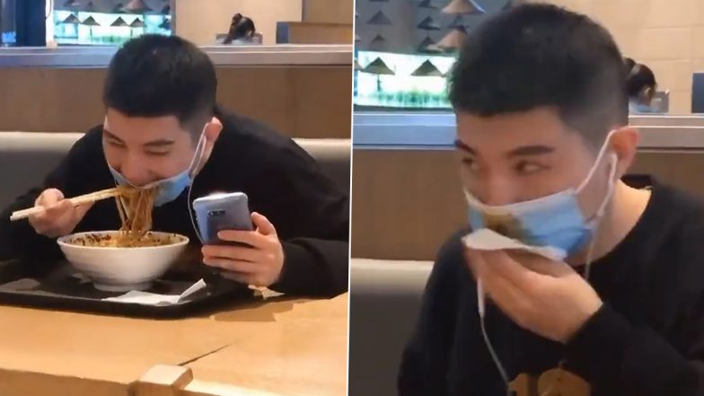 Man Wearing Face Mask Goes on to Eat Noodles While Checking His Mobile Phone, Hilarious Goof-Up Video Goes Viral