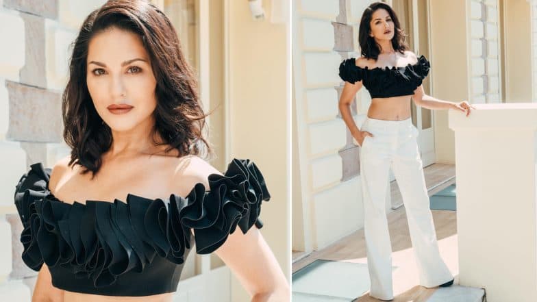 Sunny Leone at Cannes 2023: Kennedy Actress Dazzles in Chic Black Ruffle Top and White Pants (View Pics)