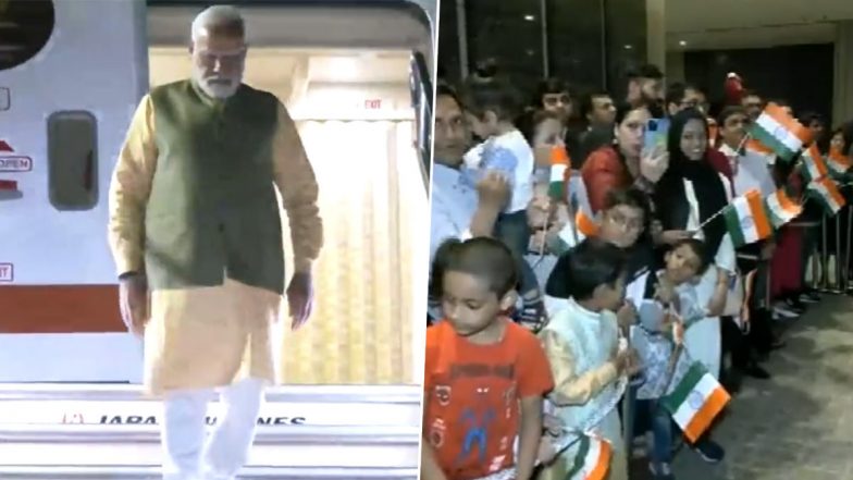 PM Narendra Modi Japan Visit: People From Indian Diaspora Gather in Large Numbers Outside Sheraton Hotel in Hiroshima to Welcome Prime Minister (Watch Video)