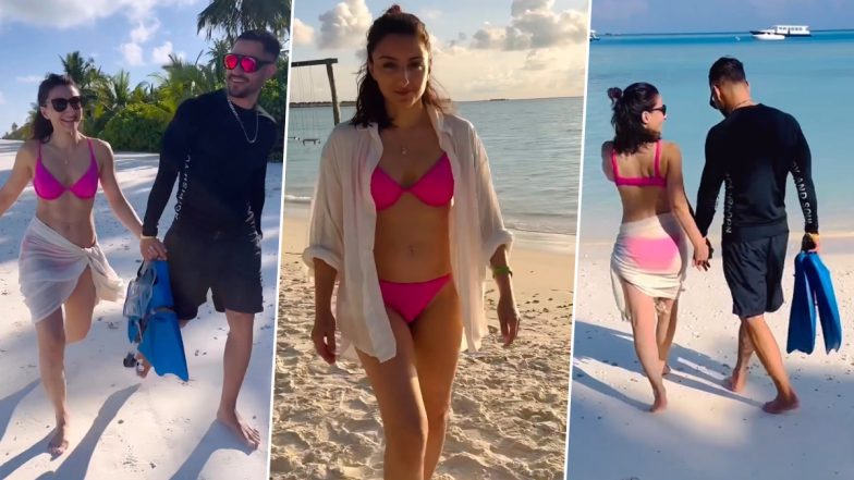 Soha Ali Khan Stuns in Pink Bikini and Sarong As She Walks Hand-in-Hand With Hubby Kunal Kemmu on Maldives Beach (Watch Video)