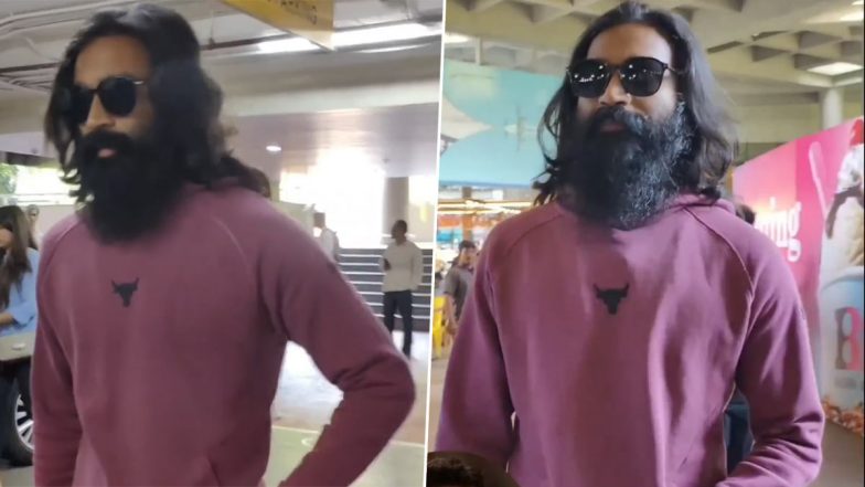 Dhanush Looks Unrecognisable in Long-Hair, Full-Grown Beard As He Gets Papped at Mumbai Airport (Watch Video)