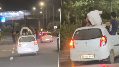 Gurugram Rash Driving Viral Video: Man Seen Doing Push-Ups on Top of Moving Car, Another Spotted Drinking; Two Arrested