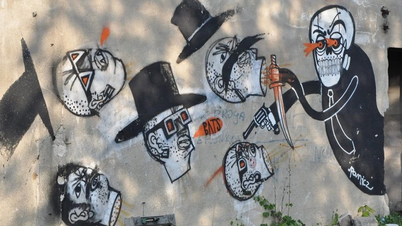 Who Is Banksy? Top Theories About the Mystery Street Artist and How He Hides His 'Real' Identity