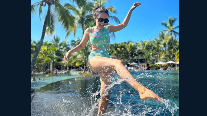 Surbhi Jyoti Rocks Cut-Out Monokini As She Enjoys Playing in Water Happily! View Pics