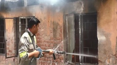India News | Uttar Pradesh: Fire Breaks out at Postal Goods Godown in Aligarh