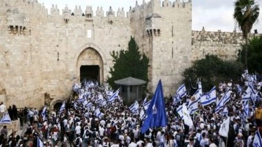 World News | Israel Uses Live Fire, Tear Gas on Palestinians Protesting 'flag March' in Gaza