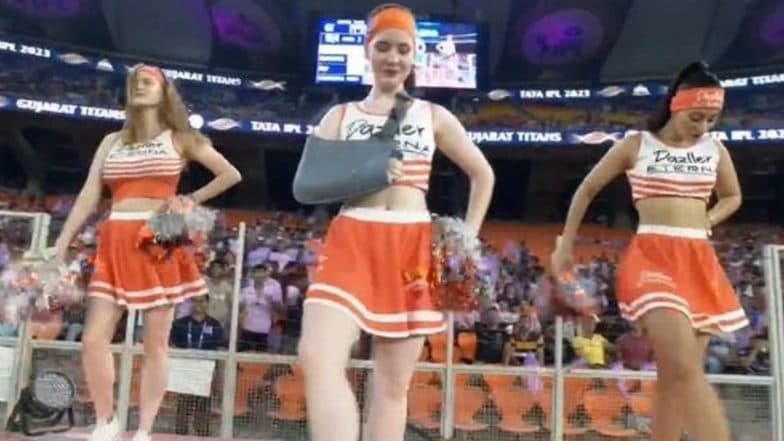 Cheerleader Performs Despite Suffering Arm Injury, Picture of her ...