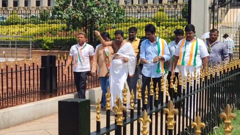 Karnataka: Congress Workers Sprinkle 'Gau Mutra' on Gates of Vidhana Soudha, Perform Pooja To Cleanse 'Taint of 40% Commission Sarkara' (Watch Video)