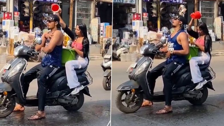 Man and Woman Take Bath Together on Bike in Middle of Road in Ulhasnagar, Record Video for Social Media; Complaint Forwarded to Traffic Police