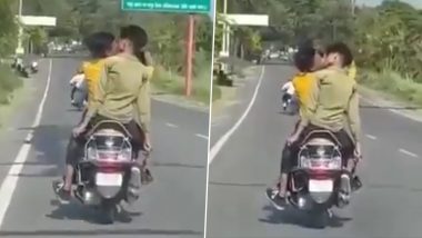 Guys Kissing in UP Viral Video: Boys Indulge in Passionate Lip-Lock on Moving Scooty in Rampur, Manhunt Launched