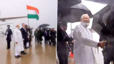 PM Modi Stands in Rain for Indian National Anthem Video: Prime Minister Narendra Modi Braves Rain as 'Jana Gana Mana' Played During Ceremonial Welcome in US