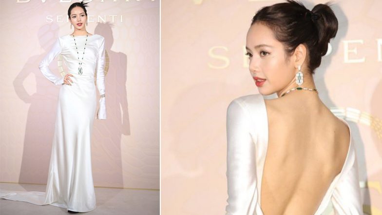 BLACKPINK’s Lisa Arrives at Bvlgari Serpenti Event in Elegant Backless White Gown (View Pics)