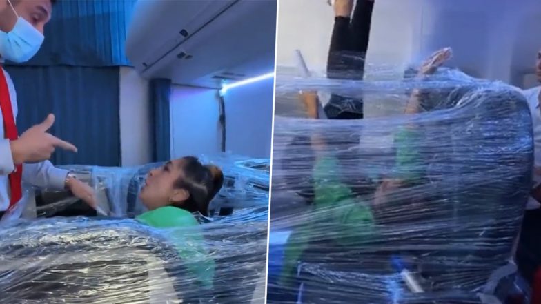 'Jugaad' On Flight! Woman Wraps Plastic Around Three Economy Seats Inside Plane To Create Her Own First Class Suite, Video Goes Viral