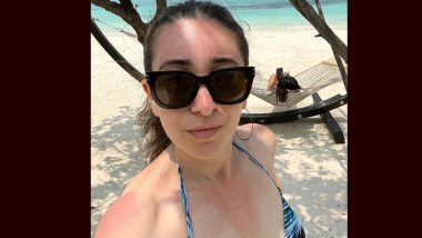 Karisma Kapoor Chills on a Beach and Shares Selfie in Blue and Black Bikini With Kareena Kapoor Photobombing in the Back (View Pic)