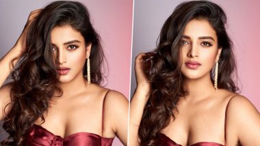 Nidhhi Agerwal Looks Drop Dead Gorgeous In Shiny Red Dress (View Pics)