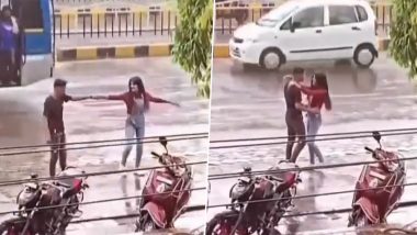 Indore Couple Dance in Rain Viral Video: Unfazed by Traffic, Young Man and Woman Dance in Rain, Netizens React to Clip