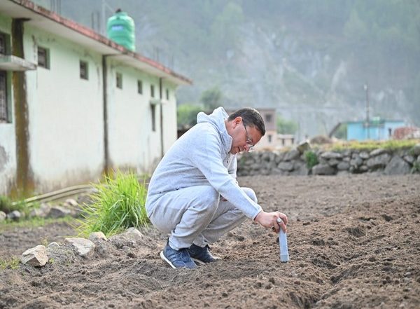 India News | Uttarakhand CM Dhami Visits Siror, Netala Villages in Uttarkashi, Sows 'Mandua' Seeds, Promotes Millet Crops
