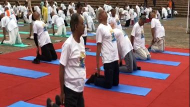 World News | Indian Ambassador to Nepal Naveen Srivastava, Tourism Minister Sudan Kirati Perform Yoga at Lumbini