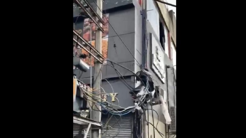 Jammu and Kashmir: Heavy Storm Sends Scooty Flying in Air in Jammu; Two-Wheeler Found Hanging in Wires on Poles (Watch Video)