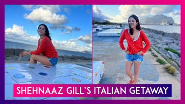 Shehnaaz Gill's Fashionable Italian Getaway: Red Cardigan & Blue Shorts At The Seafront