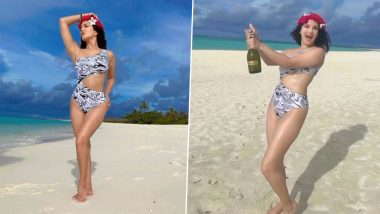 Sunny Leone Sips Champagne As She Stuns in Printed Monokini On Beach During Her Maldivian Vacay (Watch Video)