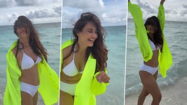 Surbhi Jyoti's Maldives Vacay! TV Actress in Bikini and Baggy Neon Shirt Is in 'Happy State of Mind' Chilling on the Island (Watch Video)