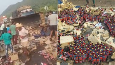 Andhra Pradesh: People Rush to Loot Beer Bottles After Van Carrying Liquor Overturns on Anakapalli-Bayyavaram National Highway (Watch Video)