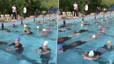 Water Yoga Video: People Perform Yoga Asanas in Swimming Pool to Mark International Yoga Day 2023 in Gujarat’s Rajkot