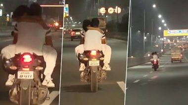 Couple Romance on Bike in Ghaziabad: Video of Couple’s Dangerous Stunt on Moving Two-Wheeler at NH9 Surfaces, Police Initiate Action