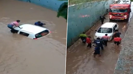 Car Submerged in Flood Water Video: Four Persons Trying to Cross Underpass Gets Stuck as Four-Wheeler Submerges in Flood Water in Gujarat, Rescued