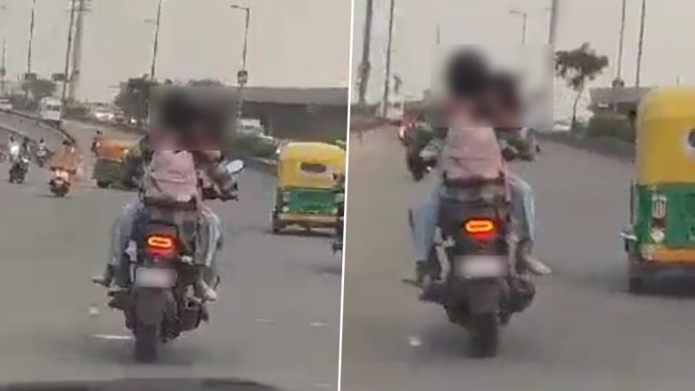 Delhi Couple Romance on Bike Video: Couple Engages in PDA on Speeding Motorcycle in Mangolpuri, Traffic Police React to Viral Clip